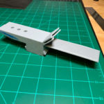 Slide one piece into the other.