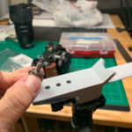 Attach the camera with a 1/4" camera bolt.